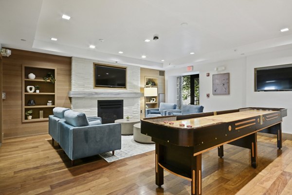 Elegant clubhouse at James and Harrison Court Apartments featuring modern design and cozy seating areas