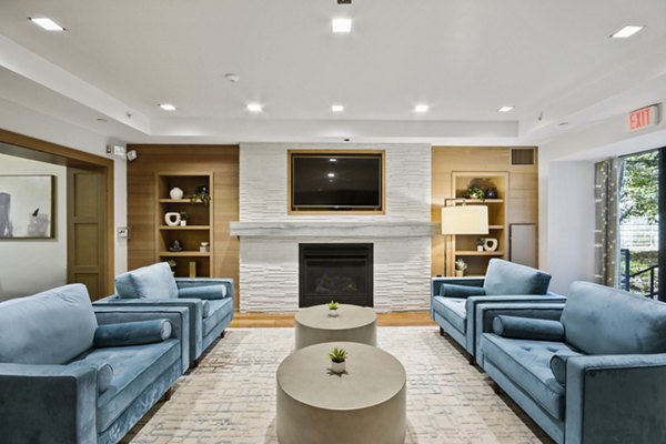 Clubhouse featuring modern decor and cozy seating areas at James and Harrison Court Apartments
