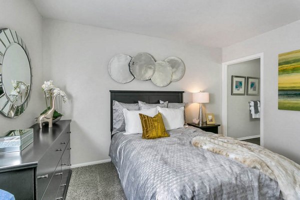 Bright bedroom with contemporary furniture at Magnolia Ridge Apartments