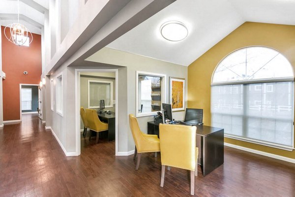 Clubhouse featuring modern lounge and seating area at Magnolia Ridge Apartments