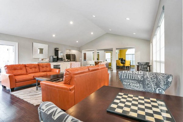 Clubhouse offering cozy lounge and modern decor at Magnolia Ridge Apartments, a Greystar luxury community in Thornton, CO.