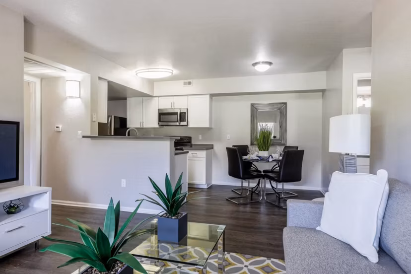 Living room with cozy seating and modern decor at Magnolia Ridge Apartments