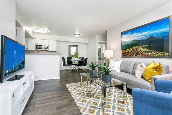 Spacious living room with stylish furnishings at Magnolia Ridge Apartments, a luxury Greystar community