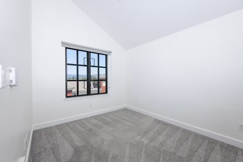 Cozy bedroom with modern decor at 1122 U Apartments, a Greystar luxury apartment community in Washington, DC