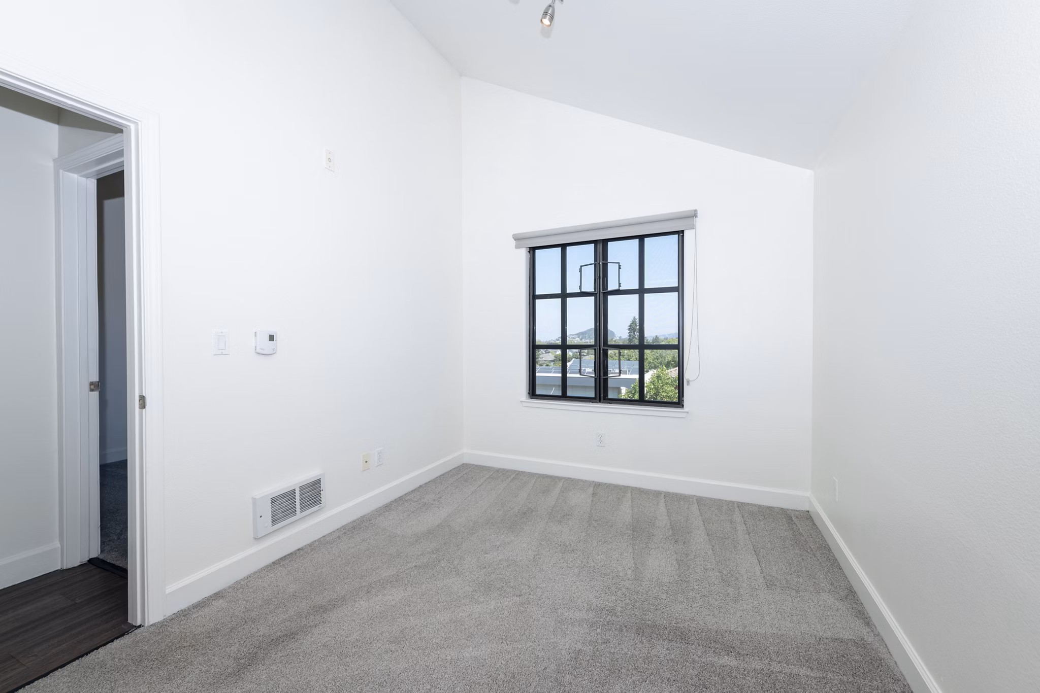 Luxurious bedroom with modern furnishings at 1122 U Apartments