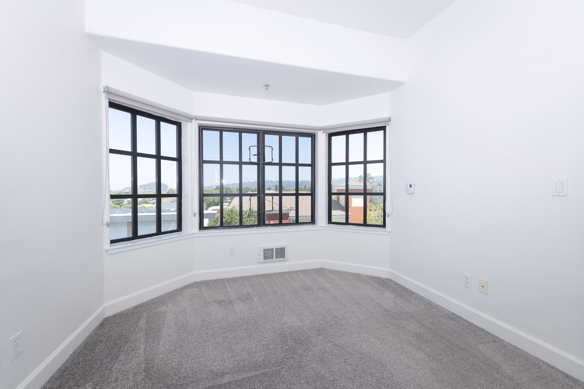 Elegant bedroom featuring king-size bed and modern decor at 1122 U Apartments