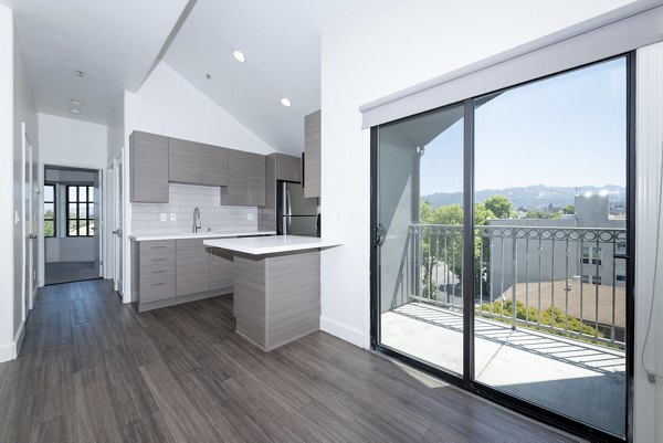 Dining area featuring modern furnishings at 1122 U Apartments, a Greystar luxury property in a vibrant urban setting