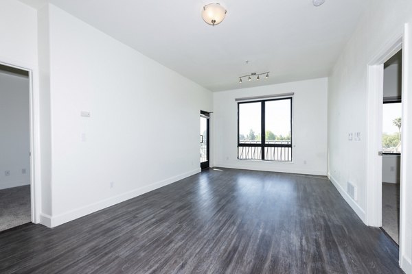 Spacious living room with modern dÃ©cor at 1122 U Apartments, showcasing luxury living in an elegant setting