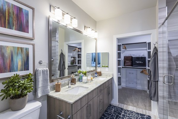 Bathroom featuring modern fixtures and sleek design at Overture Domain luxury apartments