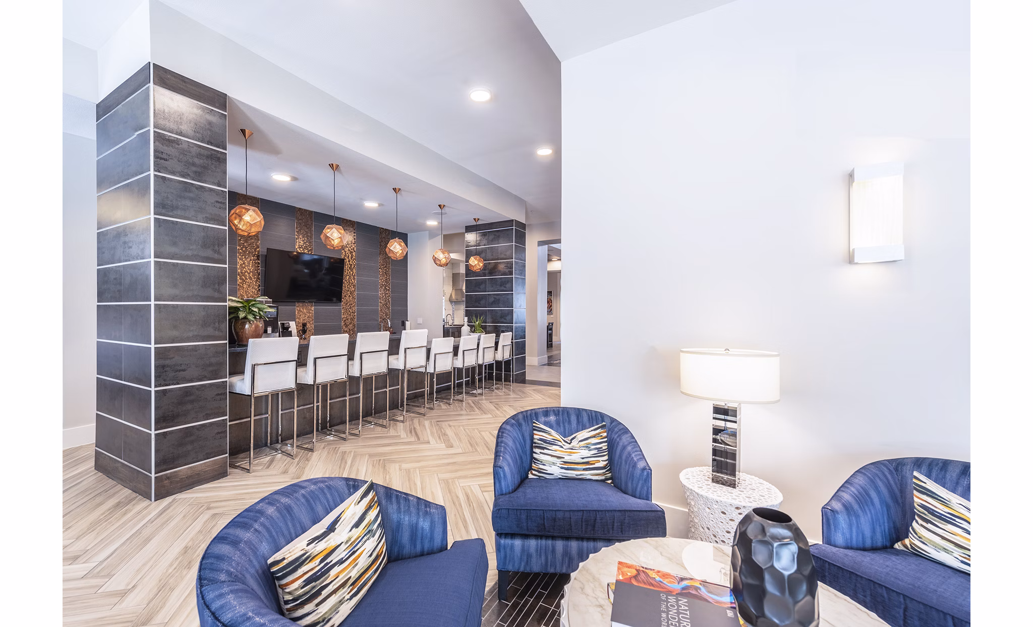 Stylish clubhouse with modern design at Overture Domain luxury apartments, perfect for social gatherings and events