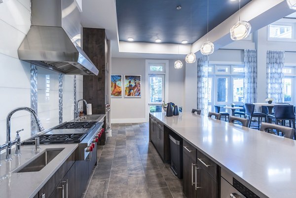 Clubhouse featuring modern decor and communal spaces at Overture Domain luxury apartments