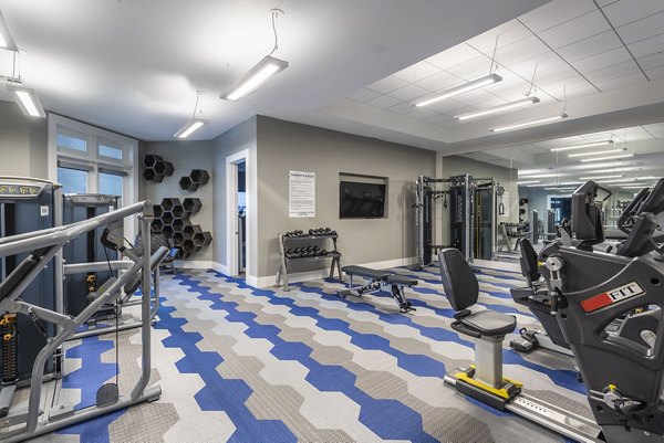 Modern fitness center with state-of-the-art equipment at Overture Domain luxury apartments