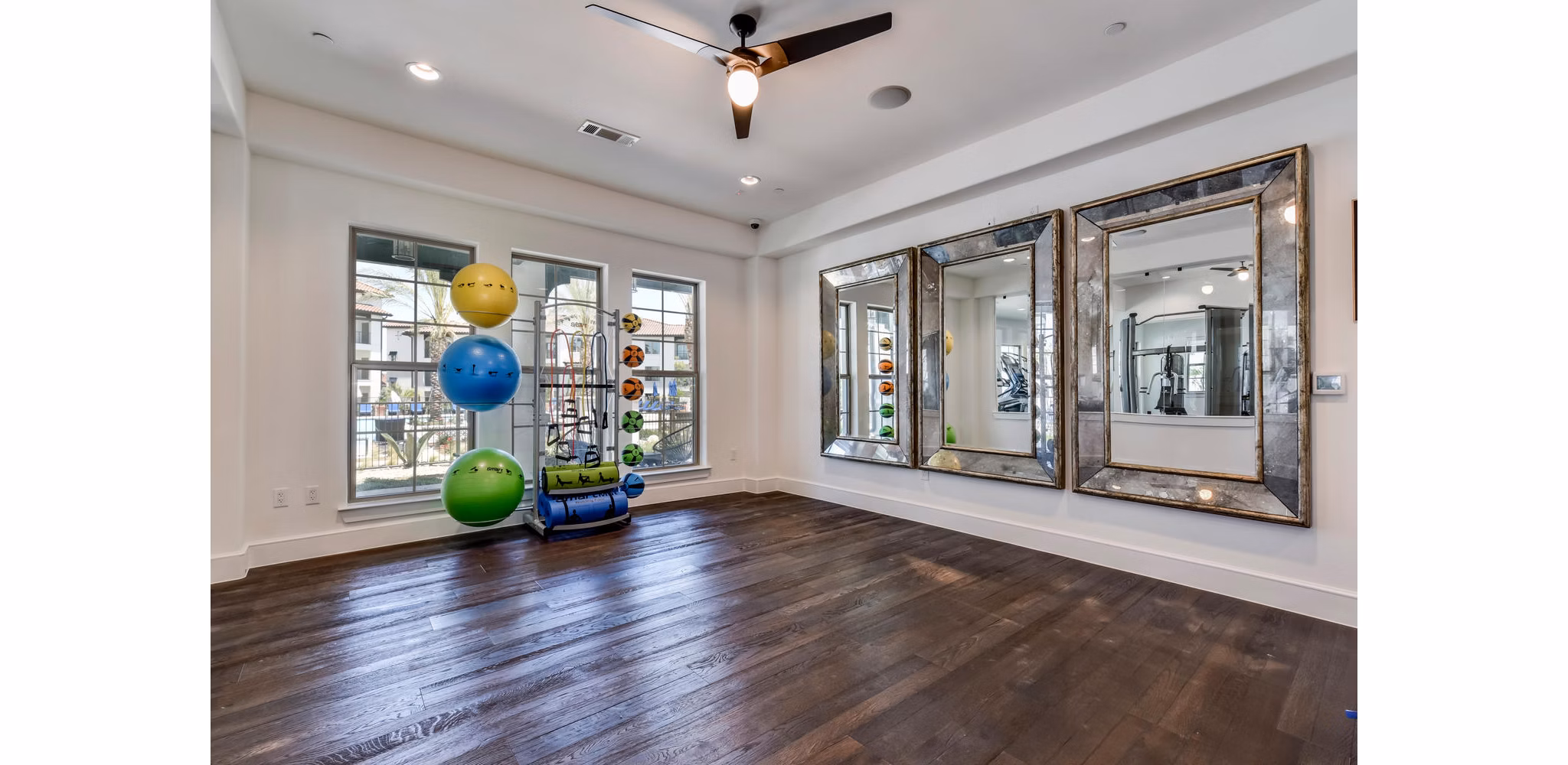 fitness center at Ambrosio Apartments