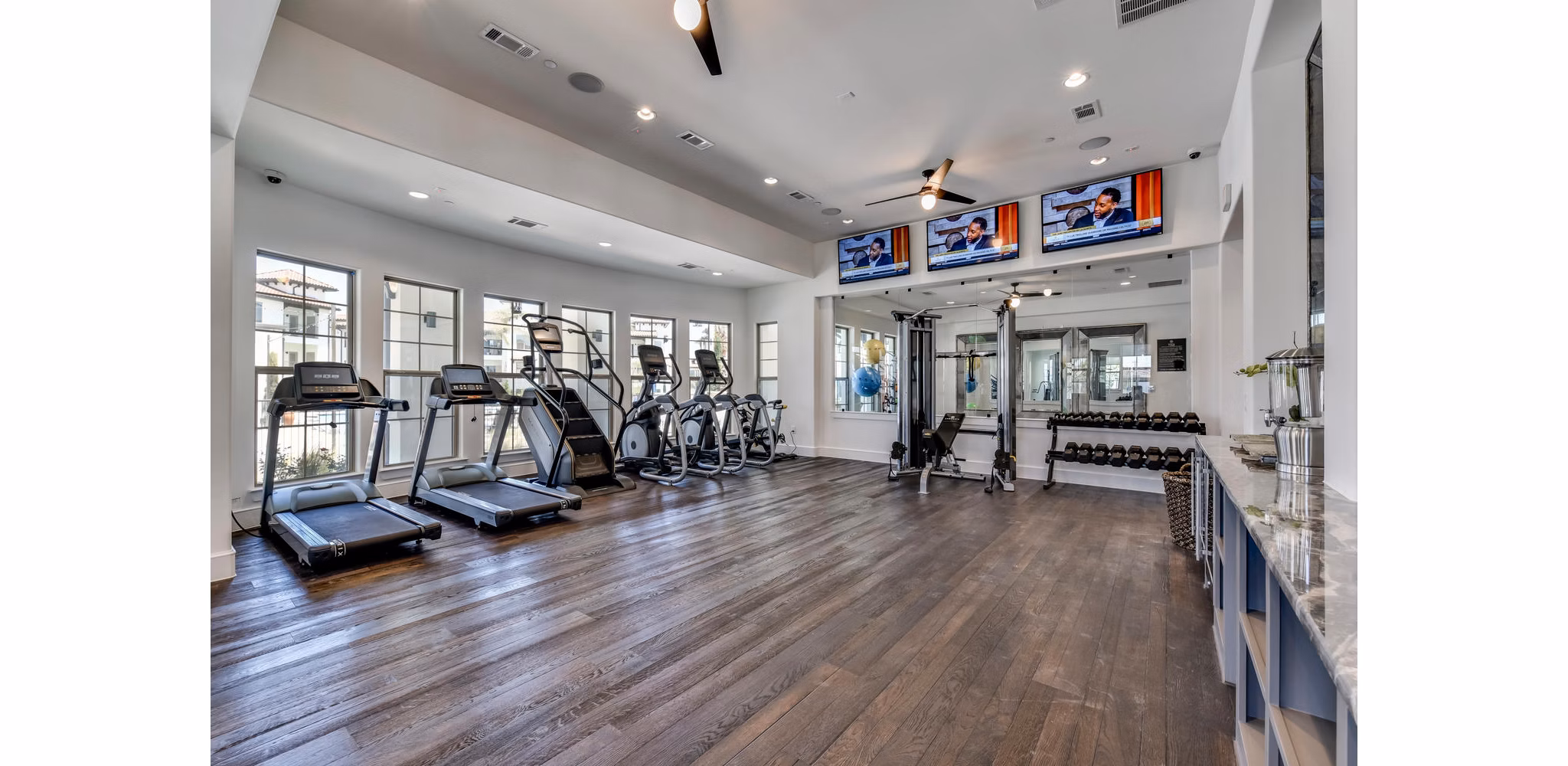 fitness center at Ambrosio Apartments