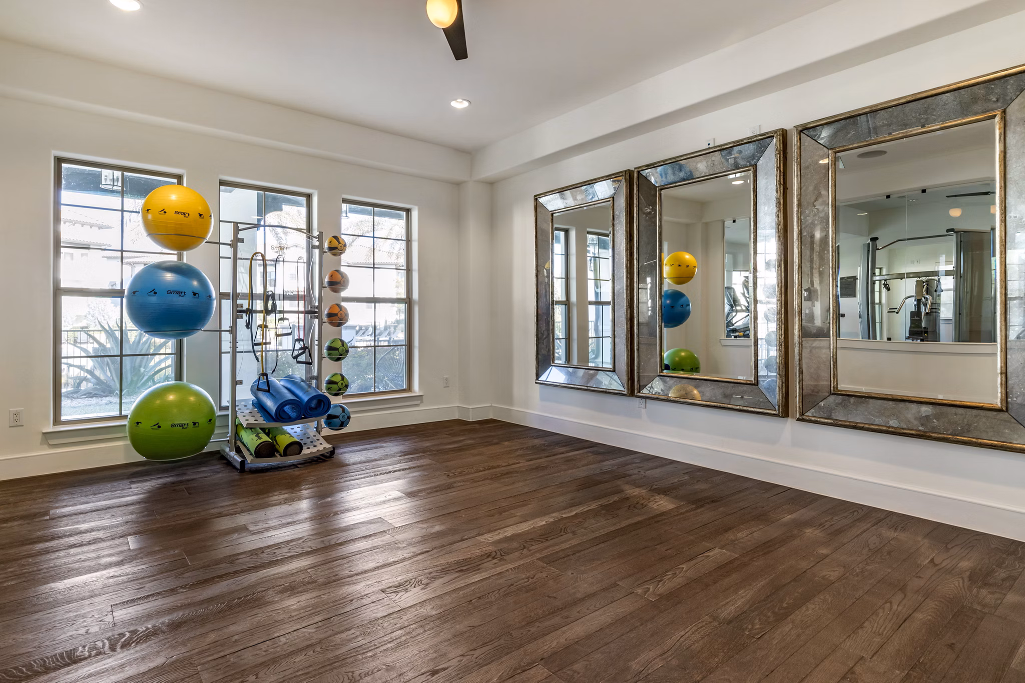 fitness center at Ambrosio Apartments