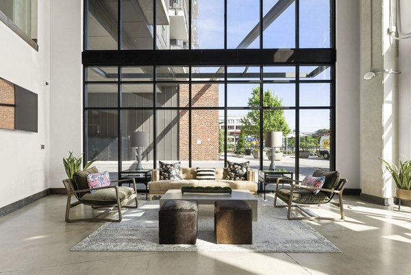 Lobby featuring modern seating and artwork at 30Six NoDa Apartments, a Greystar luxury property in Charlotte