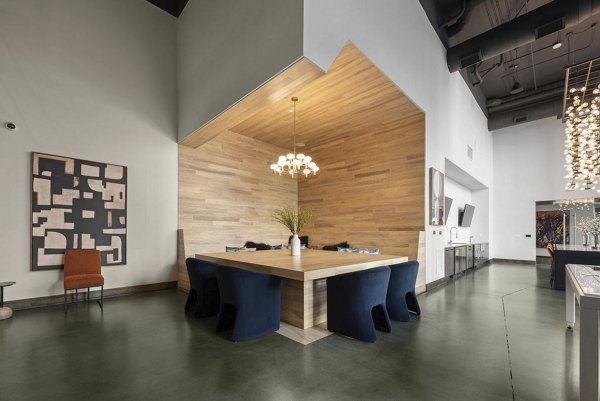Lively lobby with stylish seating and modern decor at 30Six NoDa Apartments