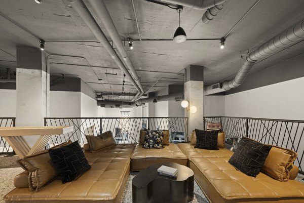 Game room featuring pool table and arcade games at 30Six NoDa Apartments
