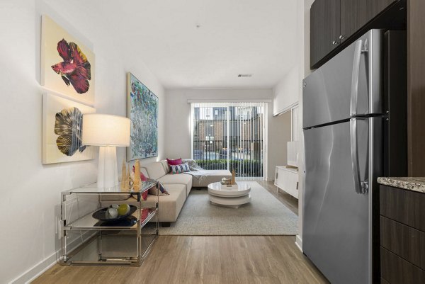 Modern kitchen with sleek countertops and stainless steel appliances at 30Six NoDa Apartments