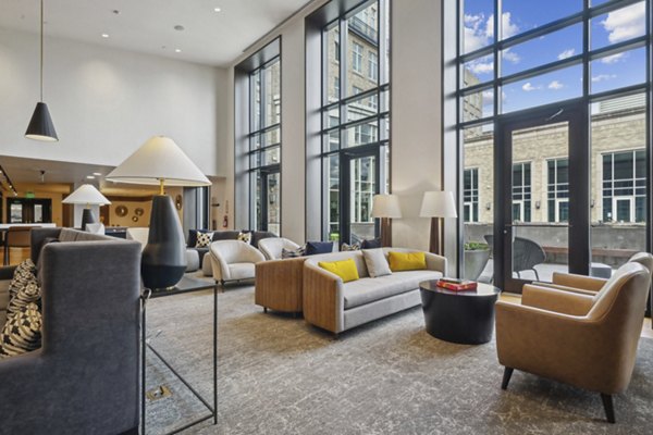 Stylish lobby featuring elegant lighting and contemporary seating at The Alexander Apartments in downtown, a luxury Greystar community