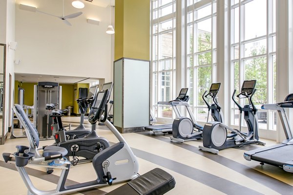 fitness center at The Alexander Apartments                                     