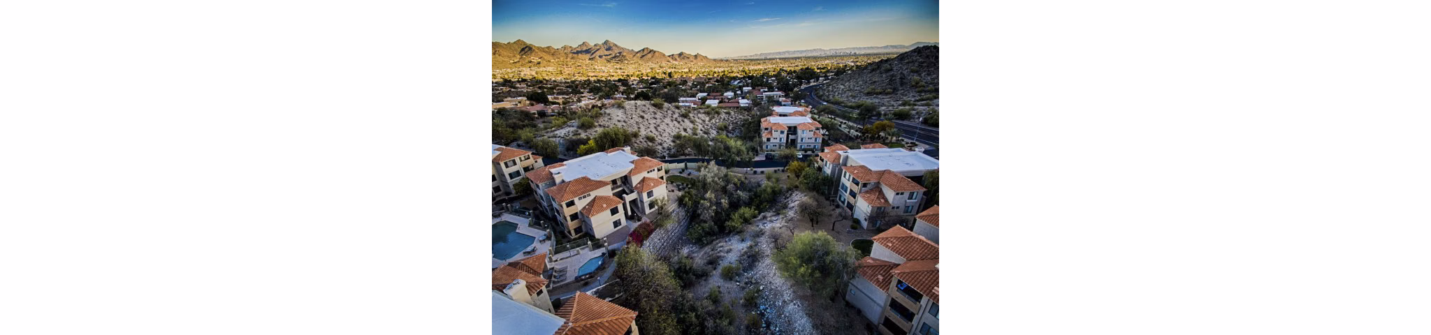 Avana at the Pointe: Elegant view of luxury apartments in a serene suburban setting