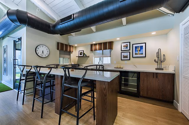 Clubhouse lobby featuring modern seating and elegant decor at Avana at the Pointe Apartments