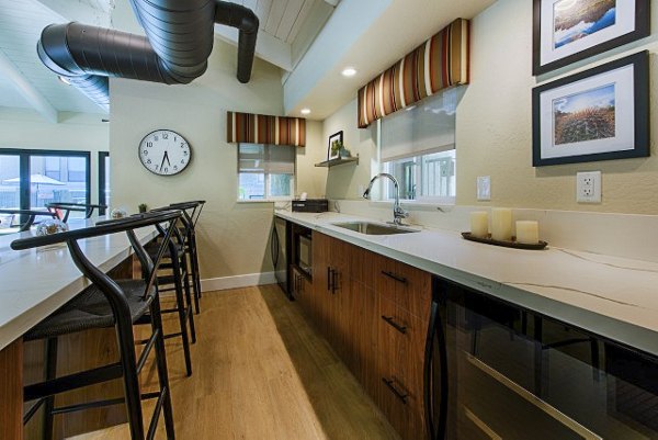 Clubhouse lobby with stylish seating and modern decor at Avana at the Pointe Apartments