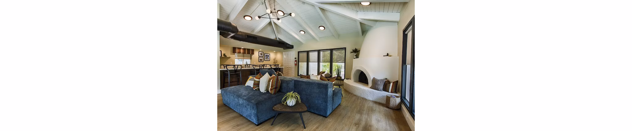 Clubhouse lobby featuring elegant decor and modern seating at Avana at the Pointe Apartments