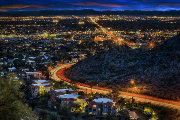 Scenic view from Avana at the Pointe Apartments overlooking lush green landscapes and vibrant community spaces