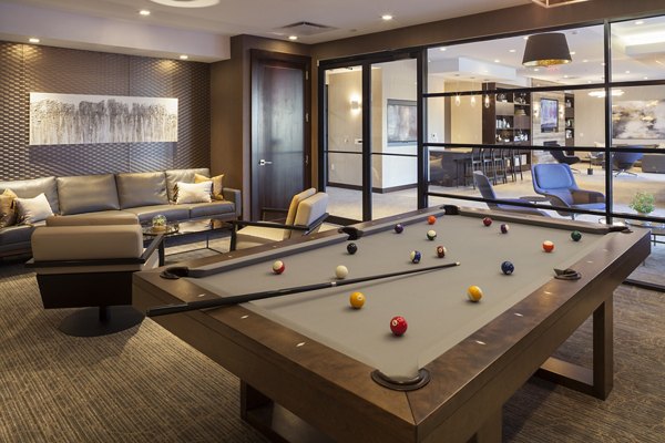 Clubhouse featuring modern furnishings at Atlantic Station Apartments, a luxury property offering premier amenities in a vibrant community