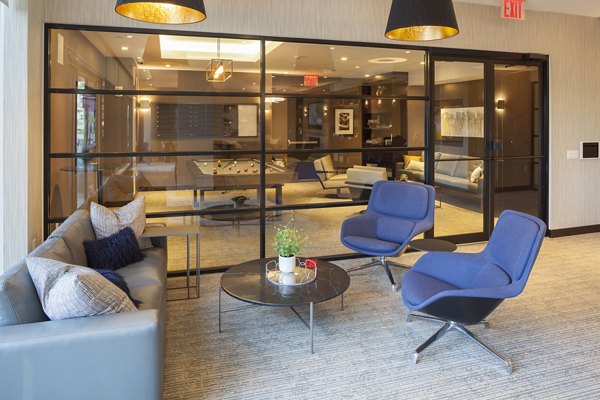 Clubhouse featuring modern furnishings and open layout at Atlantic Station Apartments