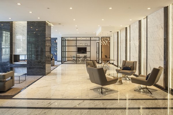 Atlantic Station Apartments: Elegant lobby with modern decor and seating in a luxury Greystar community