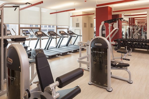 Atlantic Station Apartments: Modern fitness center with state-of-the-art equipment for luxury workout experience