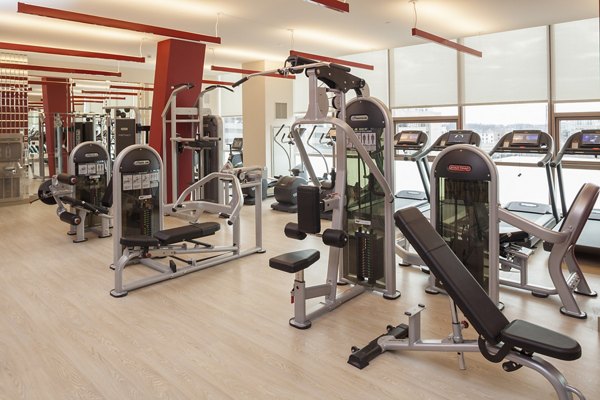 Modern fitness center with state-of-the-art equipment at Atlantic Station Apartments