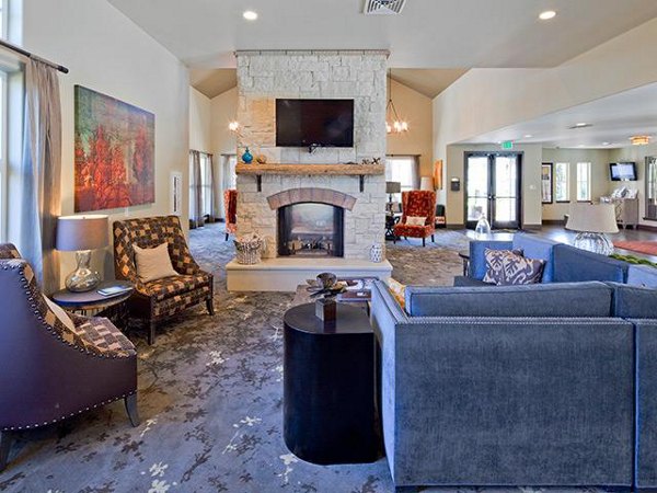 Clubhouse with modern design at Jory Trail Apartments featuring luxury seating and decor