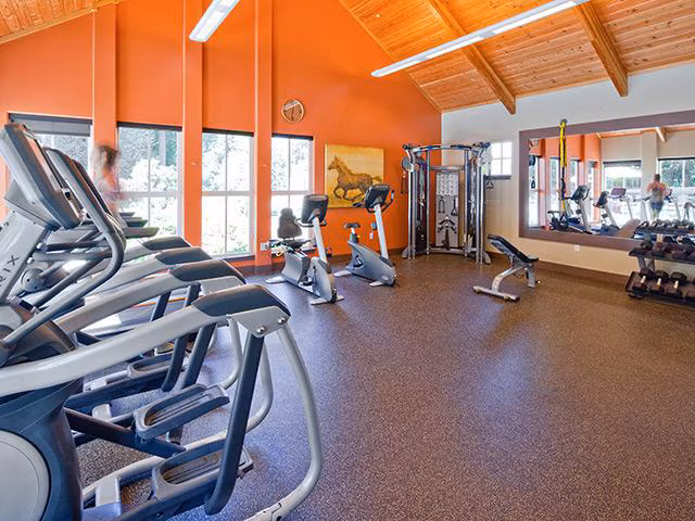 Modern fitness center with state-of-the-art equipment at Jory Trail Apartments