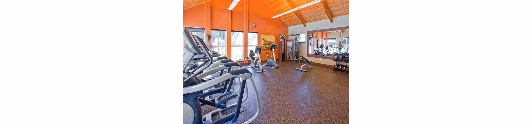 Modern fitness center with state-of-the-art equipment at Jory Trail Apartments