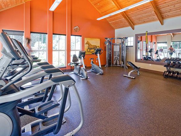 Modern fitness center with state-of-the-art equipment at Jory Trail Apartments