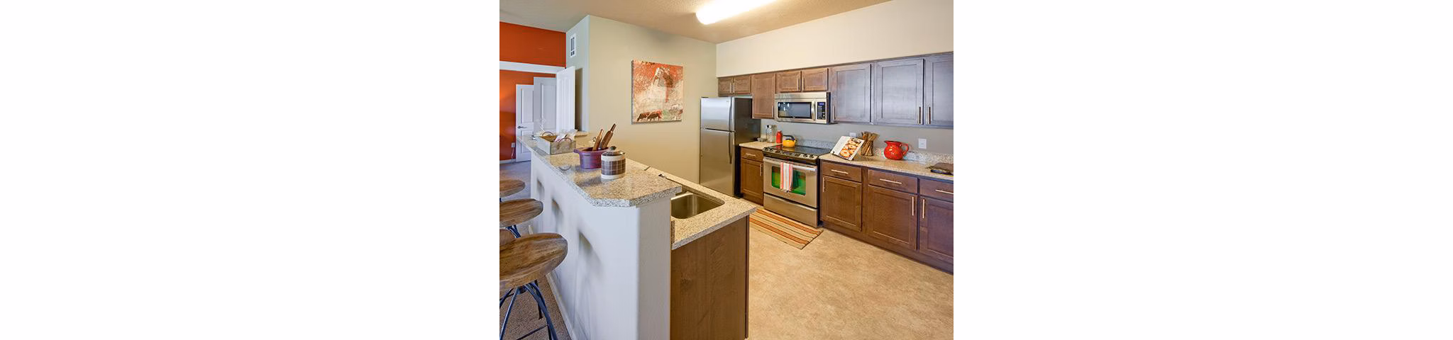 Modern kitchen with stainless steel appliances at Jory Trail Apartments