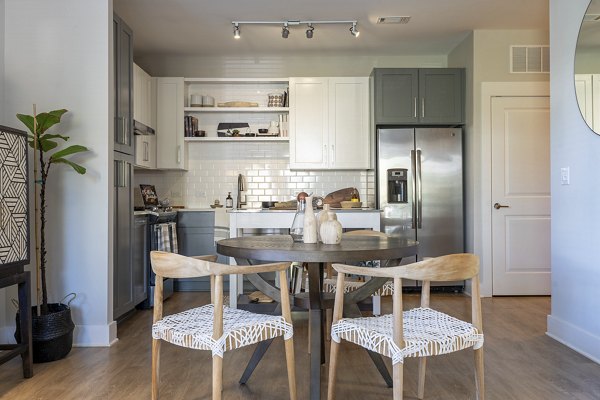 Elegant dining area with modern furnishings in The Sawyer Providence Farm Apartments