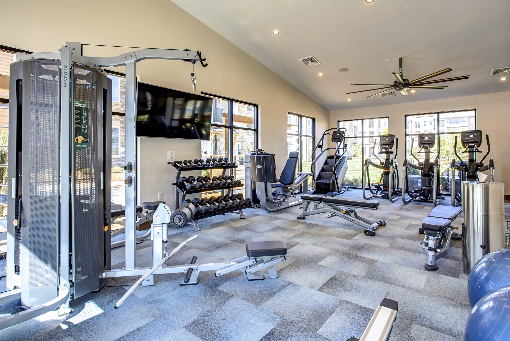 State-of-the-art fitness center at The Sawyer Providence Farm Apartments: modern equipment and spacious workout areas