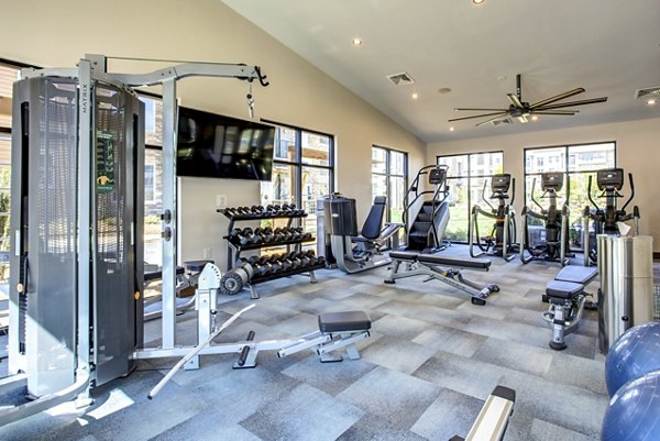 State-of-the-art fitness center at The Sawyer Providence Farm Apartments: modern equipment and spacious workout areas