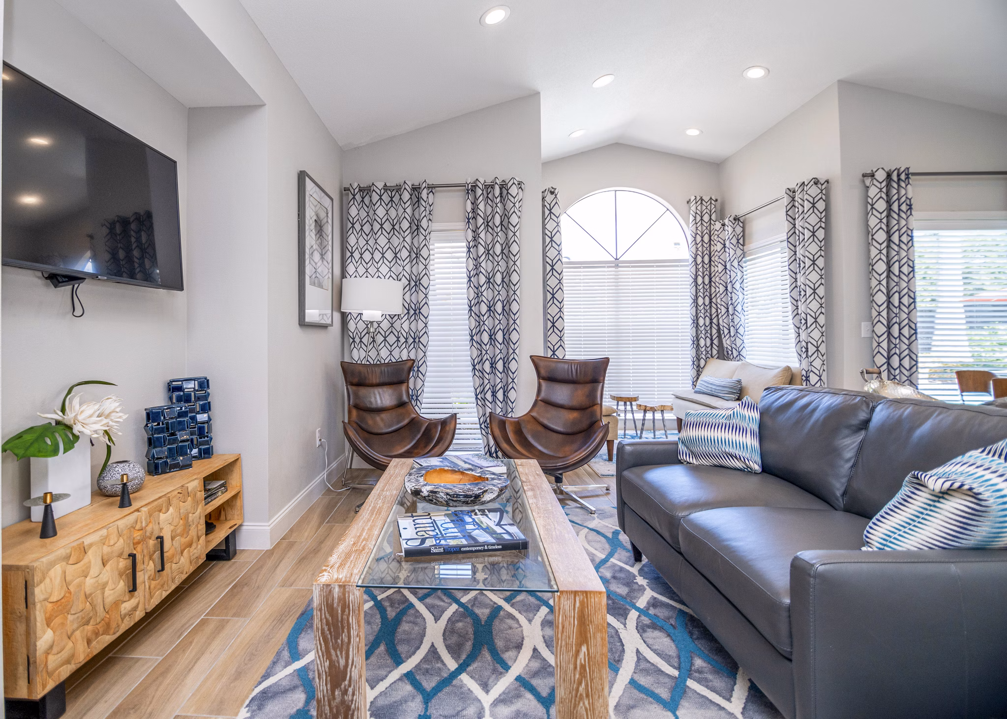 Inviting clubhouse featuring modern seating and entertainment options at Green Tree Place Apartments