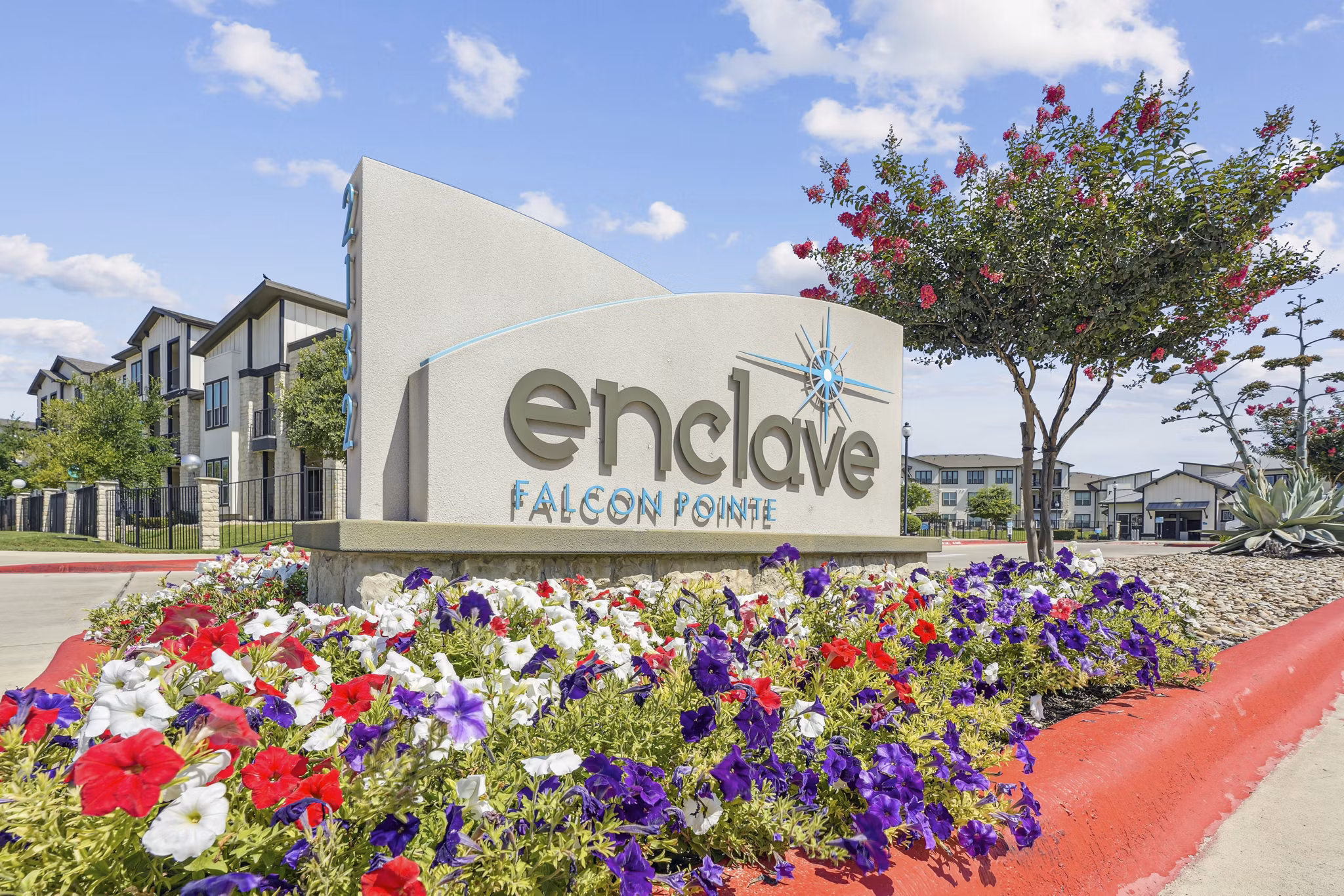 building at Enclave Falcon Pointe Apartments
