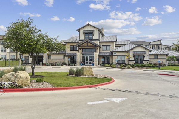 building at Enclave Falcon Pointe Apartments