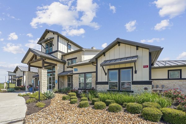 building at Enclave Falcon Pointe Apartments