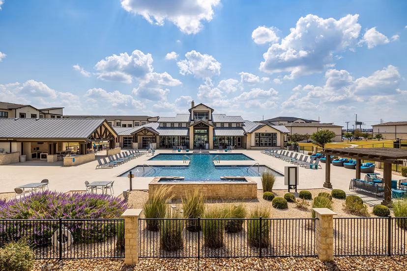building at Enclave Falcon Pointe Apartments