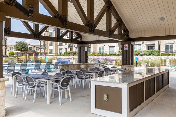 grill area at Enclave Falcon Pointe Apartments