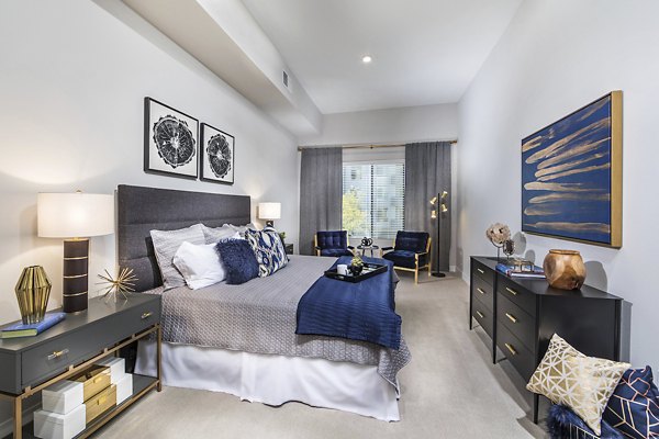 Elegant bedroom with modern decor at Overture Kierland luxury apartments